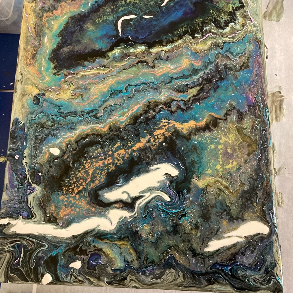 Handmade one of a kind pour painting.